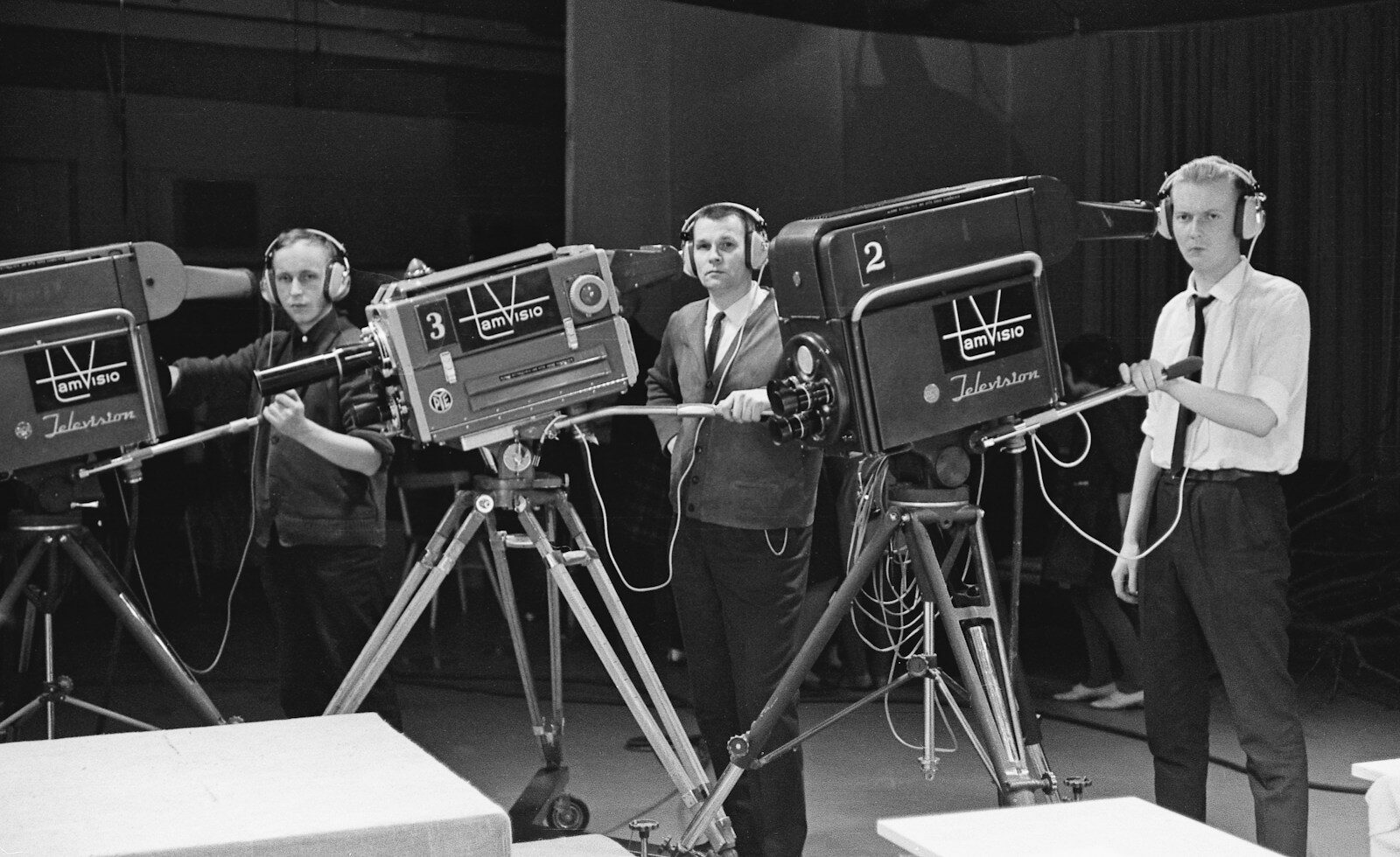 Photo by Yle Archives | Bread And Roses a group of men standing next to each other in front of a camera
